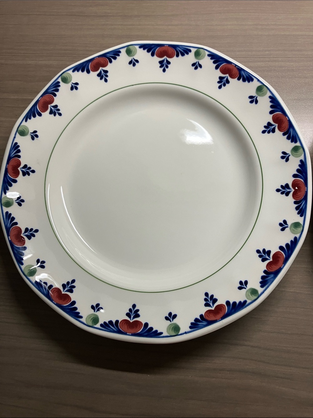 “Veruschka” White 10 1/4” Dinner Plate with Red, Blue and Green Floral Border